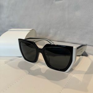 Prada SPR 15W-F Cat Eye Sunglasses